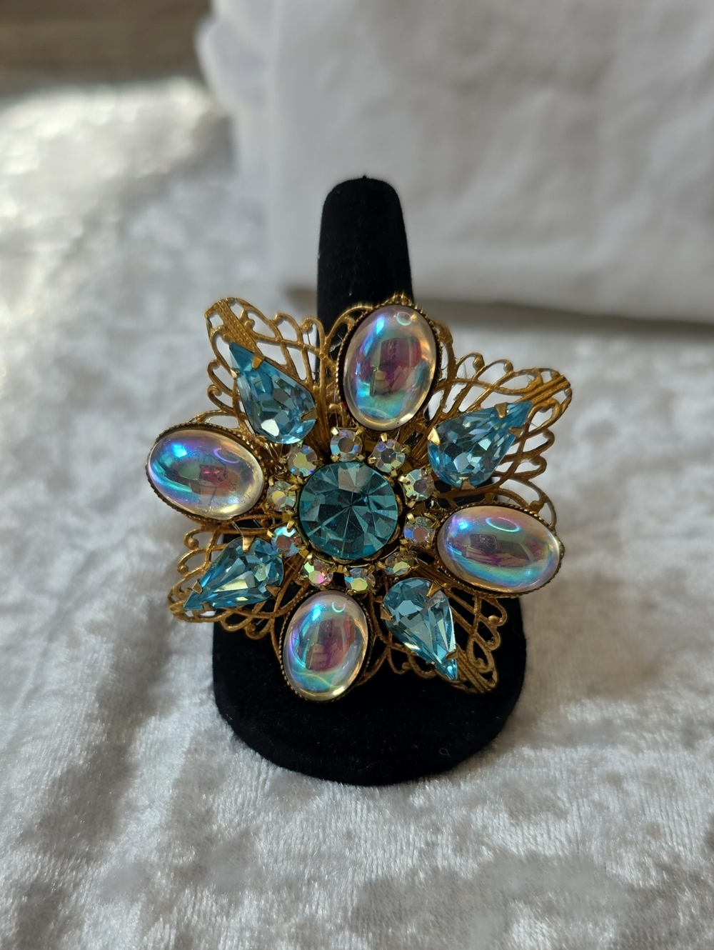 Gold-Tone Floral Statement Brooch with Blue And Iridescent Stones